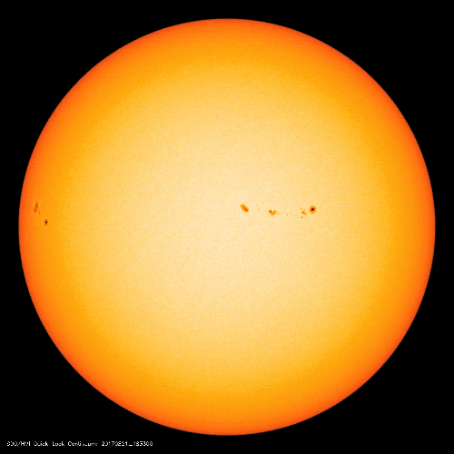 Animated GIF of the Moon crossing the Sun in visible light from NASA SDO